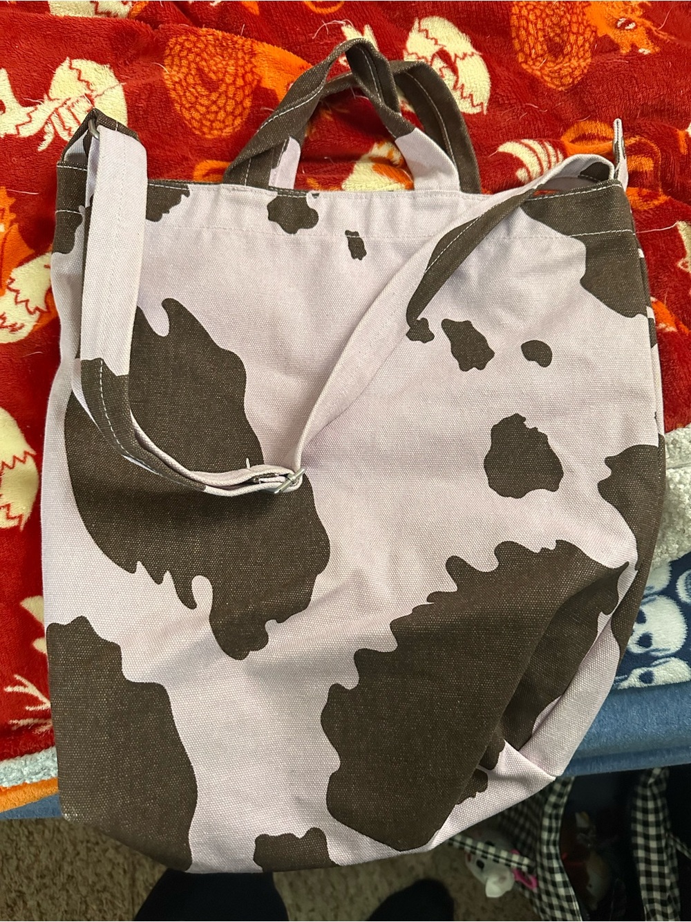 Baggu Canvas Duck Bag in Cow-Print (light pink/purple and brown)